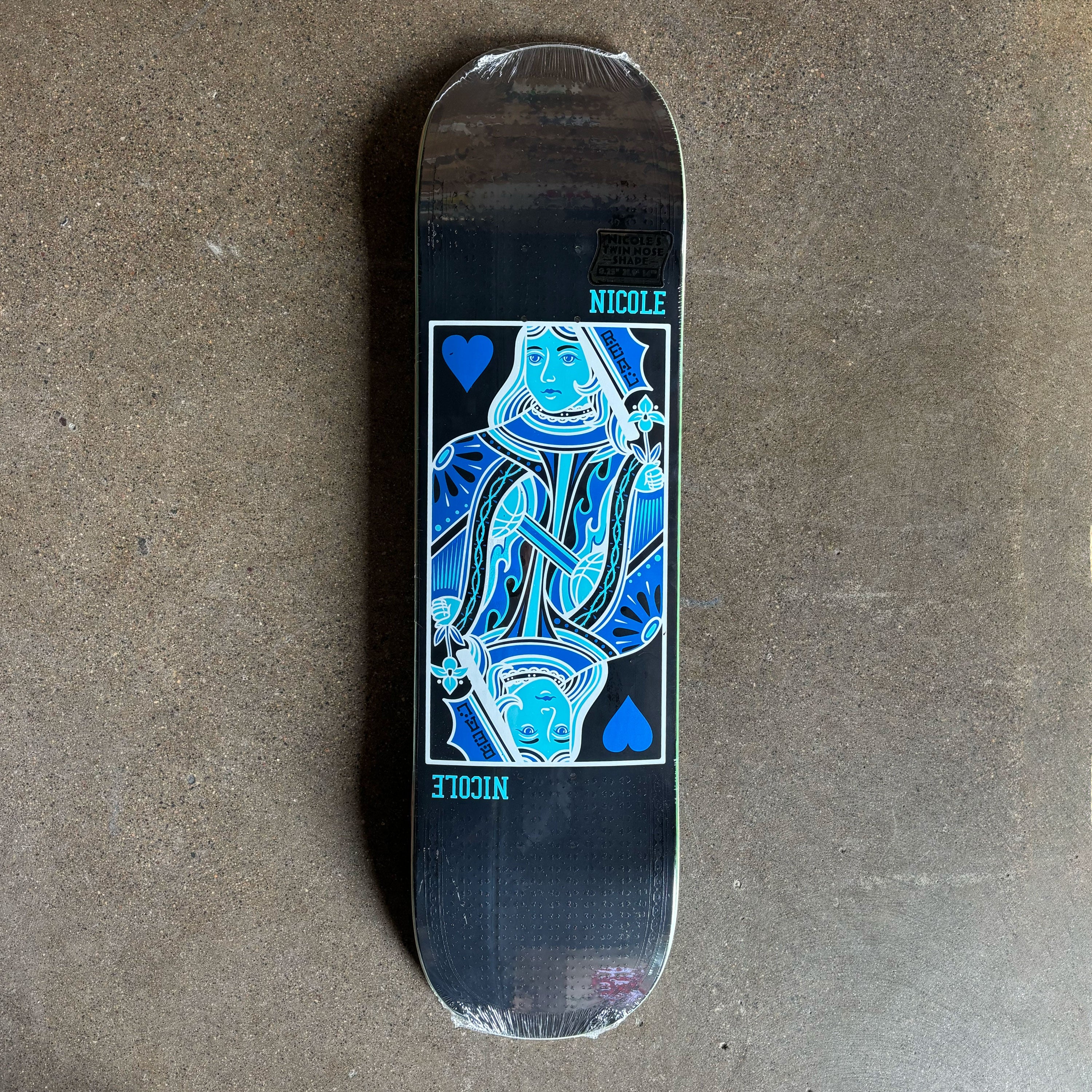 Full image of black deck with queen of hearts art in center.